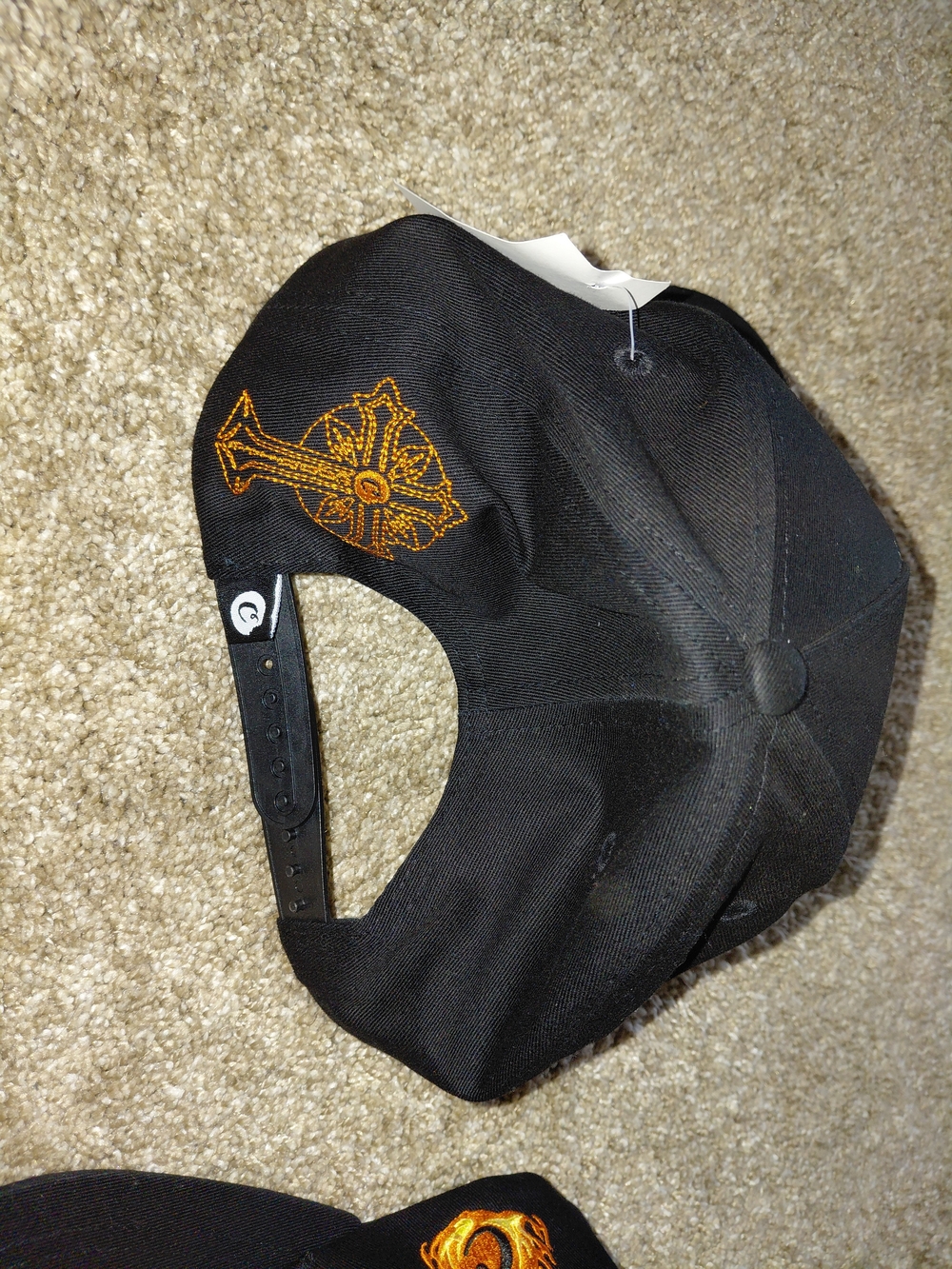 Black Snapback Hat with Orange Embroidered Cross